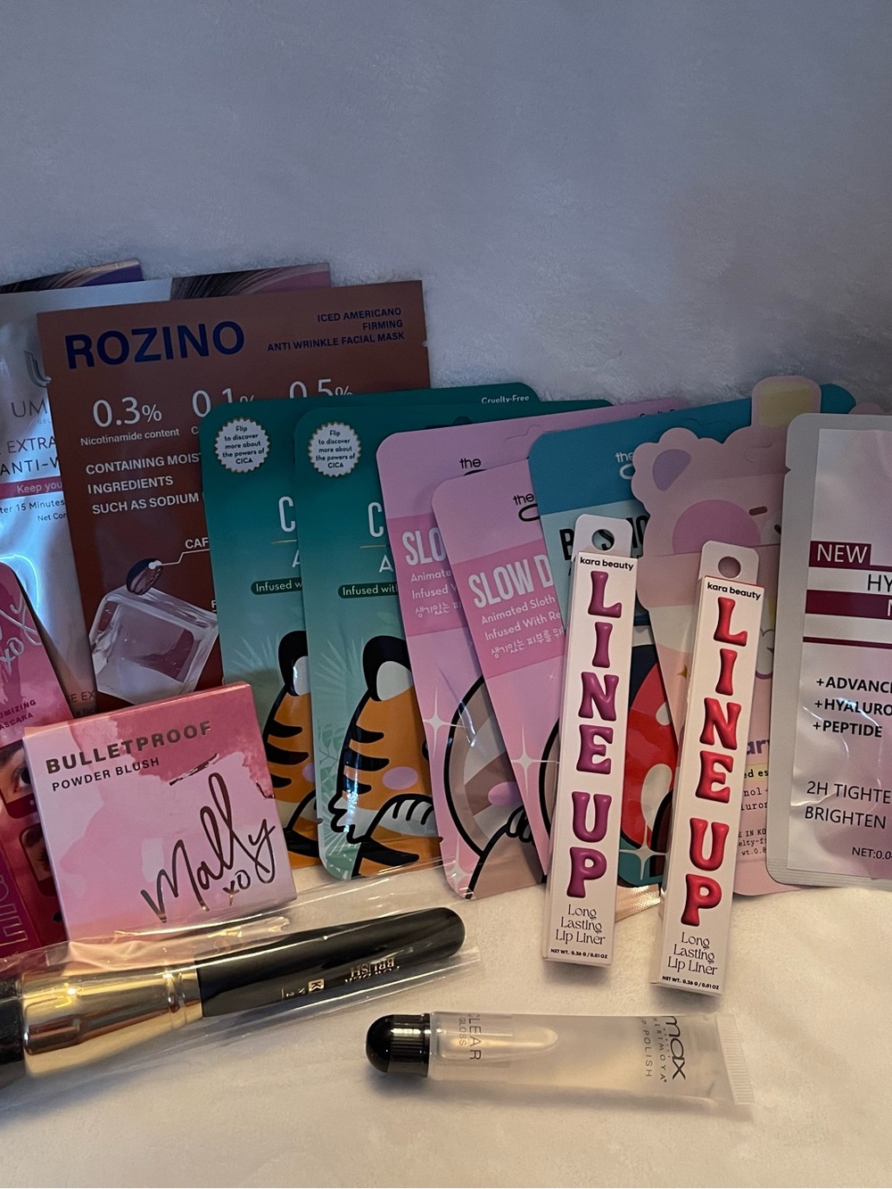 10 face masks, and other makeup items.
